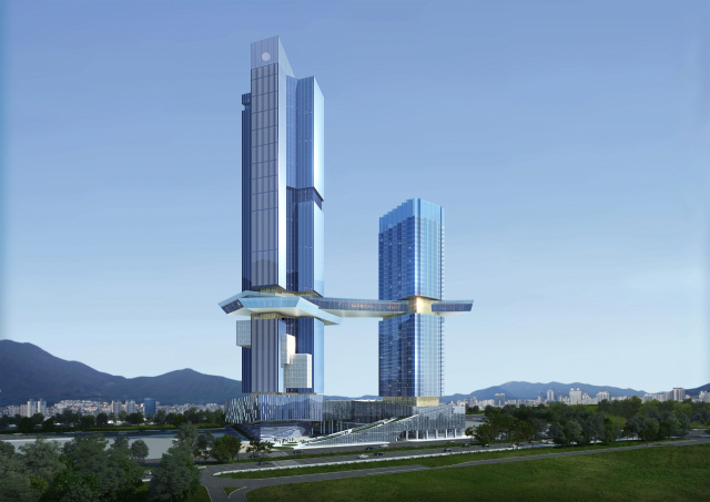 부·울·경 시공능력평가 1위 건설사인 ㈜동원개발은 ‘사는 사람이 행복한 주택 건설’이라는 철학을 바탕으로 대한민국의 주거문화를 이끌고 있다. 특히 올해부터는 공유오피스 사업에 진출하고, 한국을 넘어 베트남에서 주거한류 바람을 일으키기 위해 바쁘게 뛰고 있다. 사진은 부산 북항에 추진되는 ‘더 게이트 동원’ 조감도. 동원개발 제공