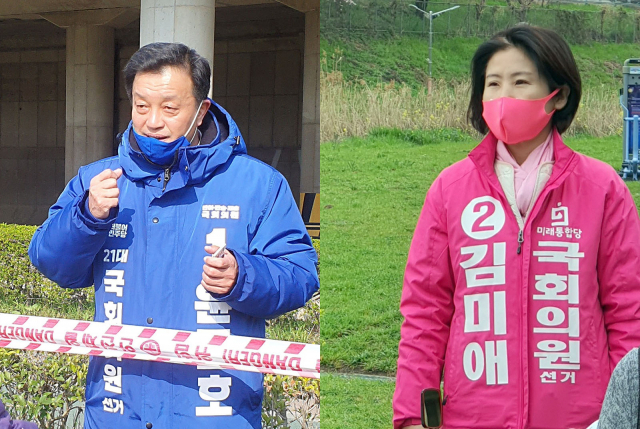 제21대 총선 후보 등록 이후 첫 일요일인 29일 부산 연제 더불어민주당 윤준호 후보(왼쪽)와 미래통합당 김미애 후보가 유권자를 만나 지지를 호소하고 있다. 연합뉴스