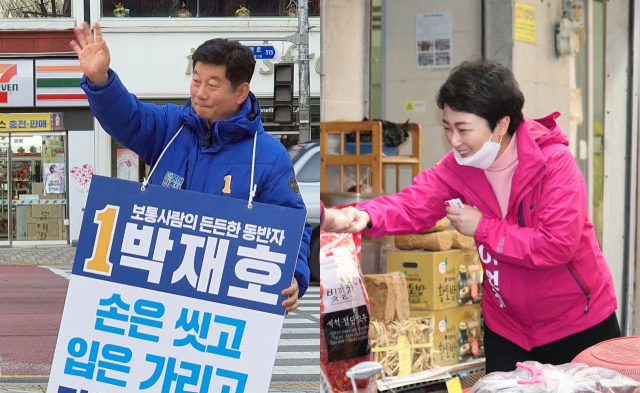 제21대 총선 후보 등록 이후 첫 주말인 28일 부산 남구을 선거구에 출마한 더불어민주당 박재호 후보(왼쪽)와 미래통합당 이언주 후보가 유권자에게 지지를 호소하고 있다. 연합뉴스