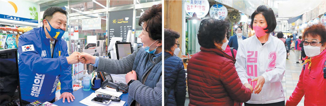 더불어민주당 윤준호 부산 해운대을 후보가 2일 오후 해운대구 반송큰시장에서 시민들과 인사를 나누고 있다(왼쪽). 비슷한 시각, 미래통합당 김미애 부산 해운대을 후보 또한 해운대구 반송큰시장에서 시민들을 만나고 있다. 정종회 기자 jjh@