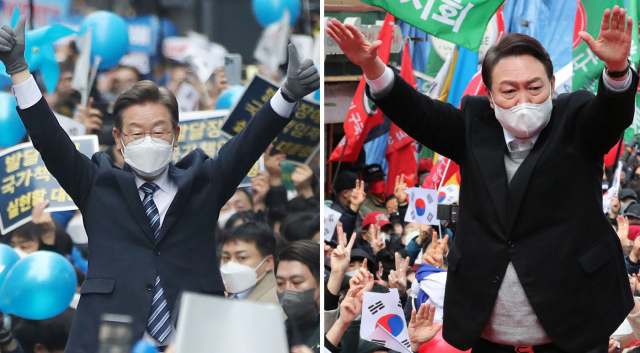 더불어민주당 이재명(왼쪽) 후보와 국민의힘 윤석열 후보가 1일 각각 서울 명동과 신촌에서 지지자들에게 두 손 들어 인사하고 있다. 김종호 기자 kimjh@·국회사진기자단