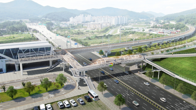 부산 기장군 동해선 오시리아역과 롯데월드 테마파크를 잇는 보행육교(조감도) 일부가 6월 말 개통된다. 부산도시공사 제공