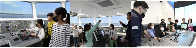 27일 세종시 해밀초등학교 학생들이 한국해양교통안전공단(KOMSA) 세종 본사에서 진행된 ‘선박운항 및 해운분야 진로탐색 체험 프로그램’에 참여해 선박조종시뮬레이션센터에서 선박운항 체험을 하고 있다. KOMSA 제공