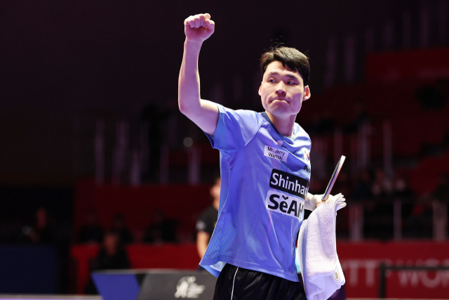 16일 부산 벡스코에서 열린 ‘BNK부산은행 2024 부산세계탁구선수권’ 조별리그 1차전 한국과 폴란드 경기에서 장우진이 승리를 따낸 뒤 주먹을 불끈 쥐고 있다. 부산세계탁구선수권 조직위 제공