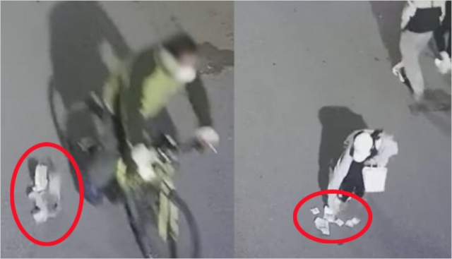 한 남성이 자전거를 타고 가다 현금을 흘리고, 이를 발견한 고등학생이 돈을 줍는 모습. 경찰청 유튜브 화면 갈무리