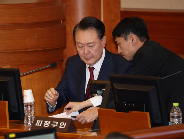 윤석열 대통령이 지난달 23일 서울 종로구 헌법재판소에서 열린 탄핵심판 4차 변론에 출석했다. 연합뉴스