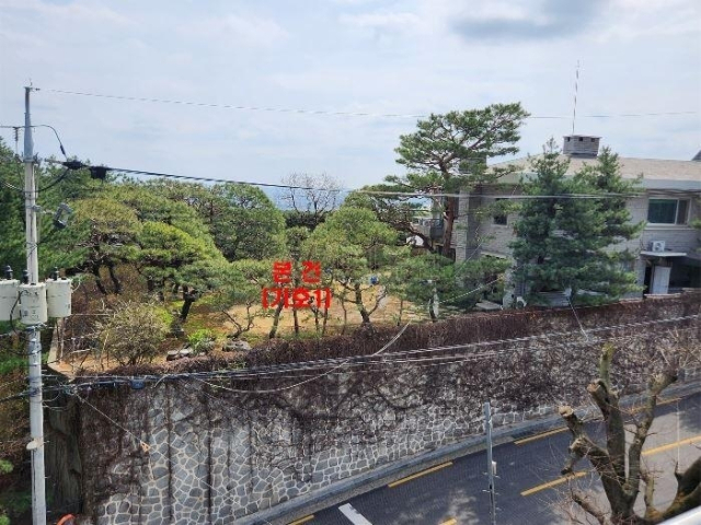 강제경매가 진행 중인정대선 전 HN Inc 사장 소유의 서울 성북동 대지. 지지옥션 홈페이지 캡처. 연합뉴스