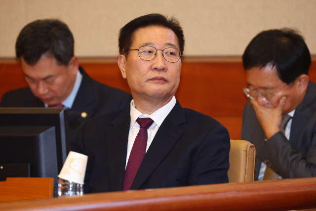 박성재 법무부 장관이 3월 18일 서울 종로구 헌법재판소에서 열리는 탄핵심판 1회 변론에 출석해 있다. 연합뉴스