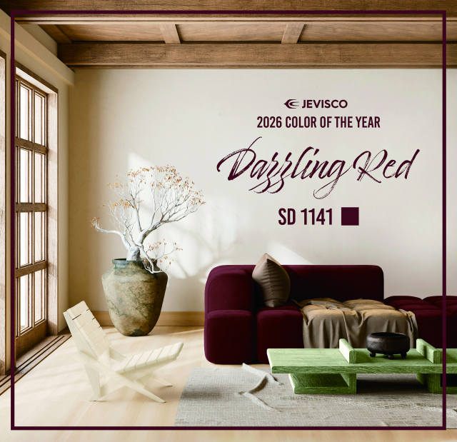 강남제비스코 ‘2026 올해의 컬러’로 선정된 다즐링 레드로 꾸며진 소파와 벽.강남제비스코 제공