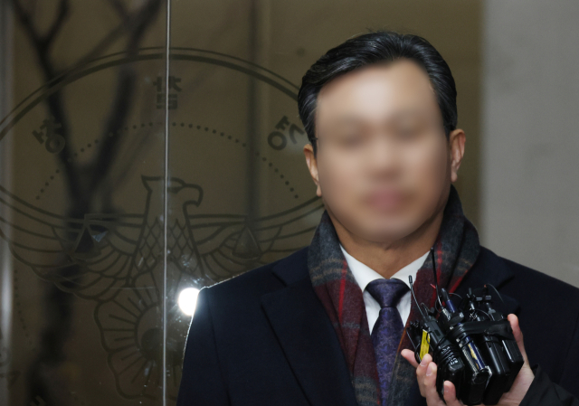 통일교의 정치인 금품 의혹 관련 통일교 세계본부 총무처장을 지냈던 조 모 씨가 23일 서울 서대문구 경찰청에 참고인 신분으로 출석하고 있다. 연합뉴스