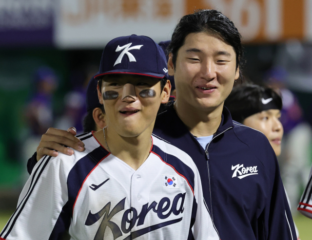 추석 당일 슈퍼라운드 한일전을 치를 가능성이 높은 야구 대표팀 투타 핵심 김도영, 곽빈. 연합뉴스